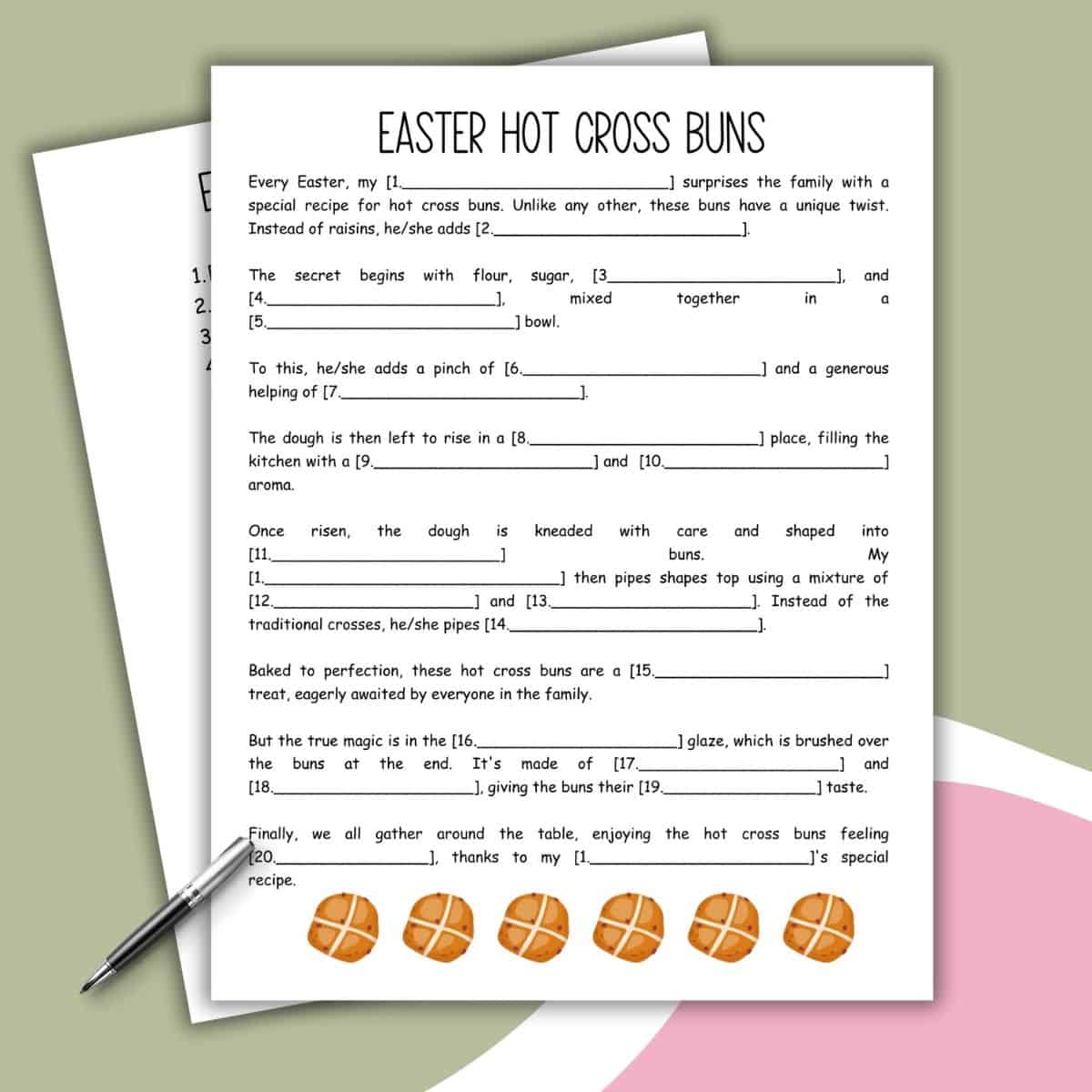 A printed Easter Mad Libs hot cross buns activity sheet with fill-in-the-blank questions. Six illustrated hot cross buns are at the bottom, while a pen rests beside the paper on a pink and green surface.
