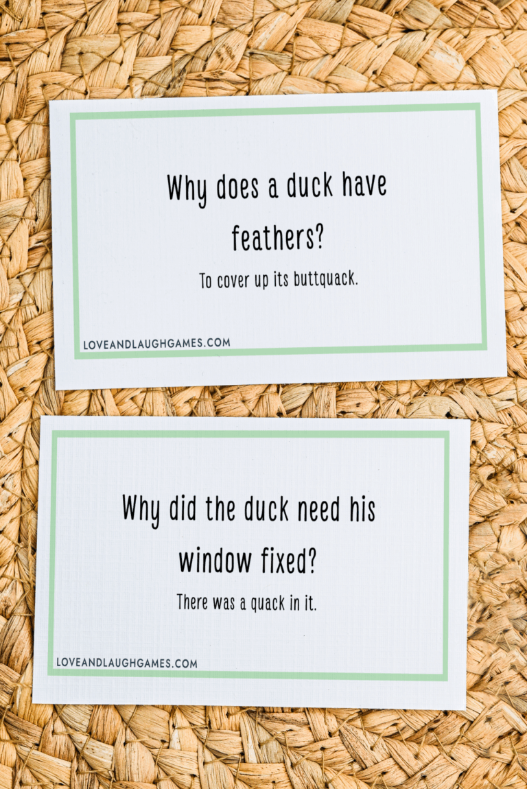 Two cards on a woven surface feature duck jokes. The first asks, Why does a duck have feathers? Answer: To cover up its buttquack. The second: Why did the duck need his window fixed? Answer: There was a quack in it.