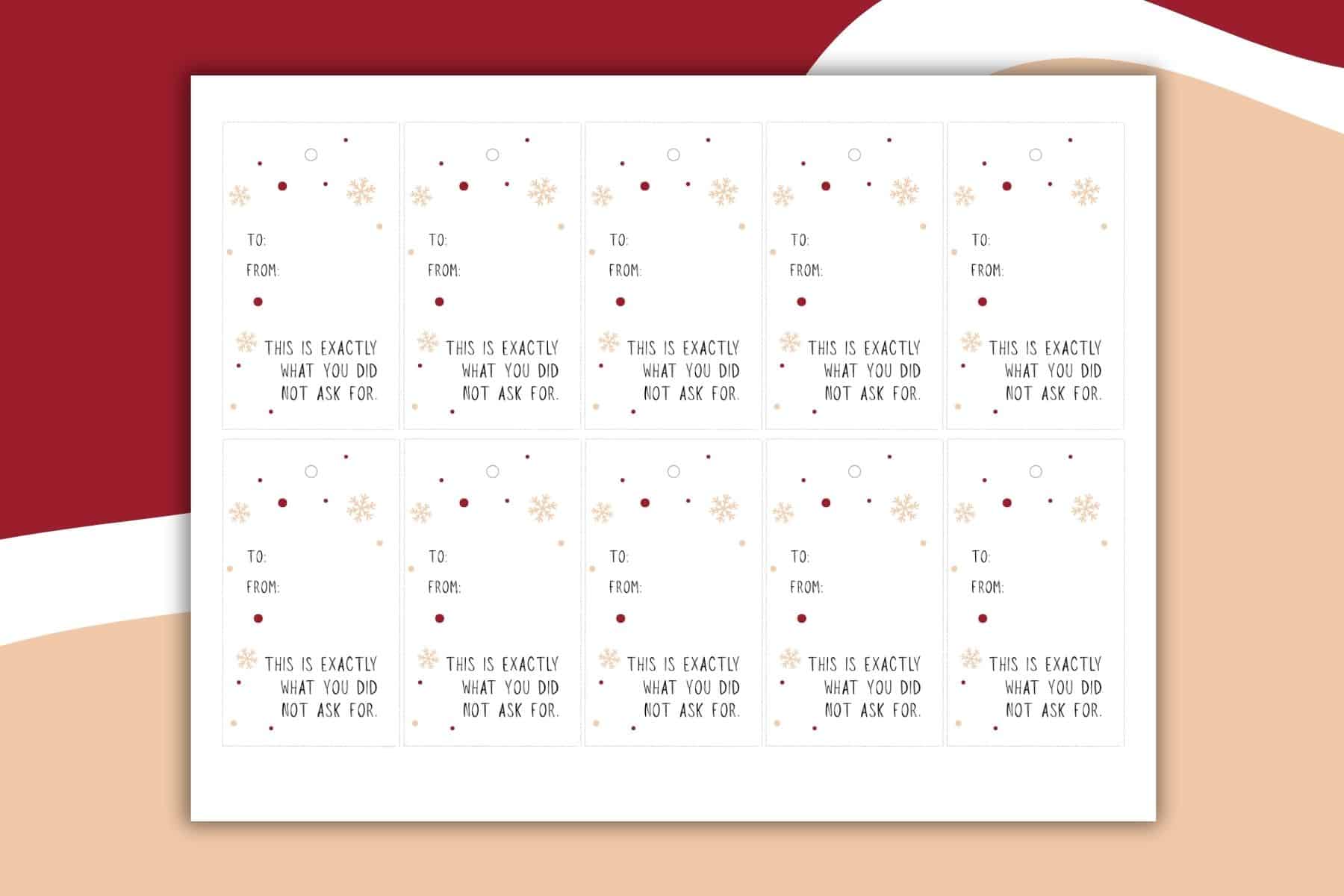 A sheet of twelve Gift Tags with snowflakes and dots. Each tag features spaces for To: and From: plus the message “This is exactly what you did not ask for.” in the bottom half.