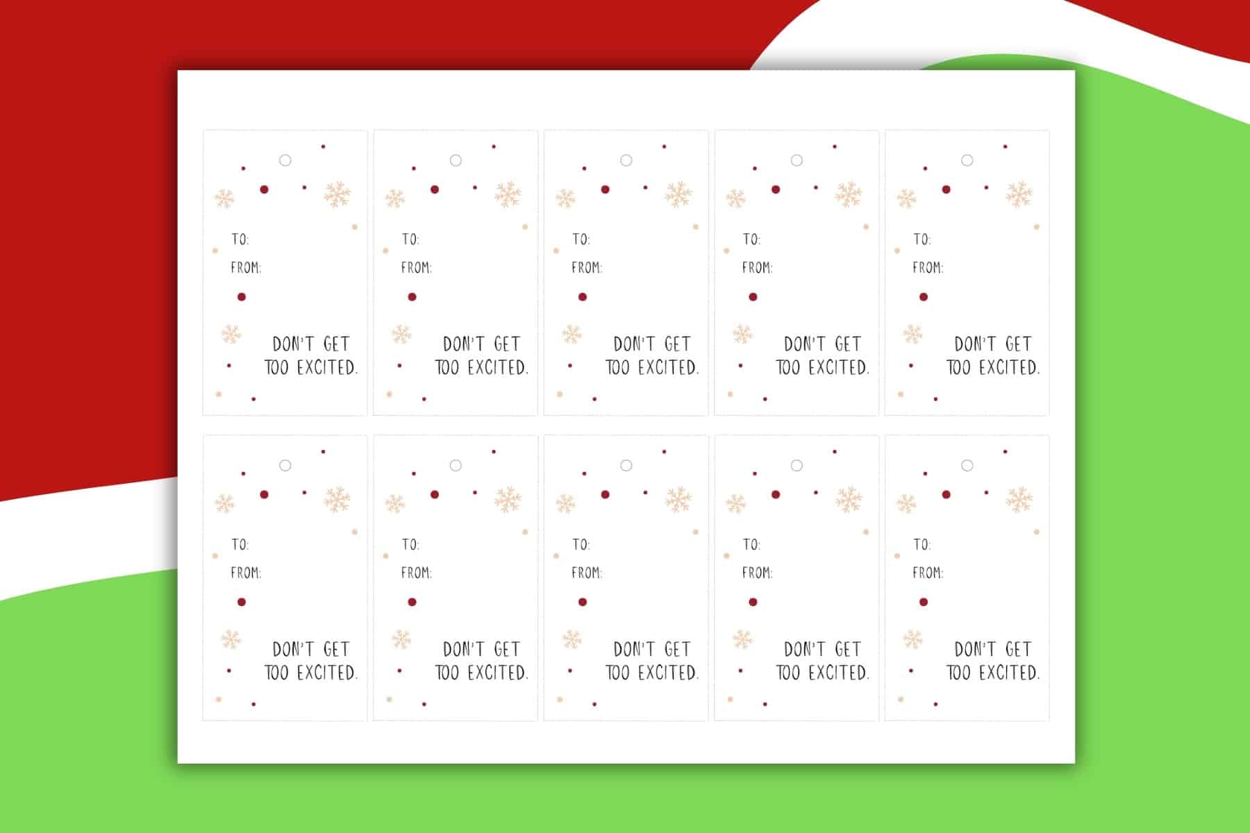 A set of twelve printable Gift Tags featuring red and gold snowflakes and dots, labeled TO, FROM, and the phrase DONT GET TOO EXCITED. The festive background combines red, white, and green for a cheerful holiday touch.